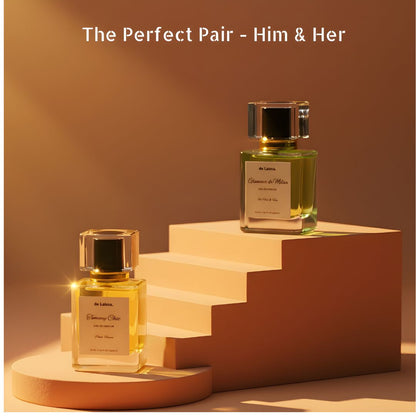 The Perfect Pair Him & Her by de Lalma, long lasting and luxury perfume bundle featuring Glamour de Milan (Impression of Aqua di Gio Profundo by Armani) and Tommy Chic (Impression of Tomy Girl by Tomy Hellfiger), displayed on premium display steps with warm studio lighting.